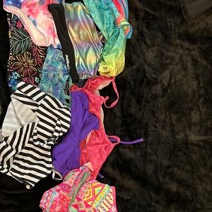 Bathed suit tops and two bottoms 7-8